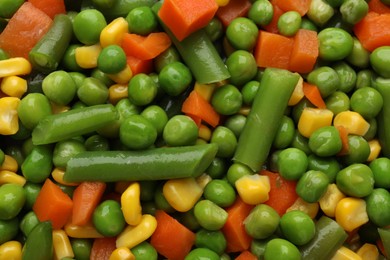 Mix of fresh vegetables as background, top view