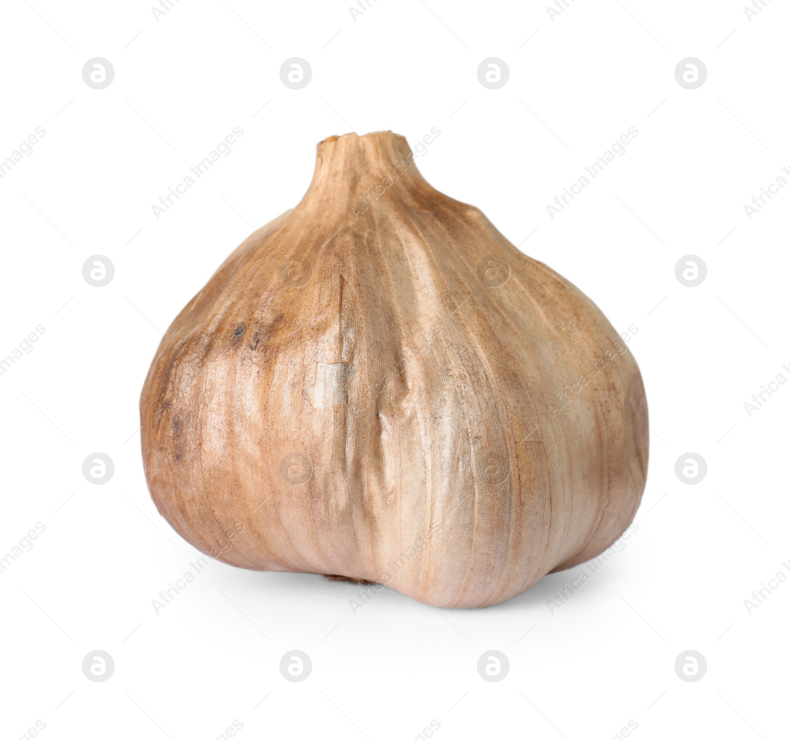 Photo of Unpeeled bulb of black garlic on white background