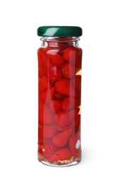 Jar with pickled hot peppers on white background