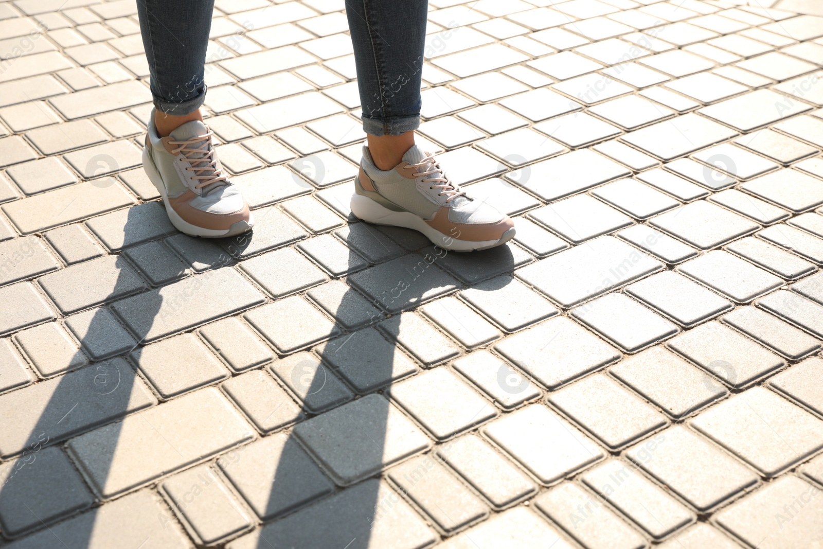 Photo of Woman walking outdoors, closeup with space for text. Choosing way concept.