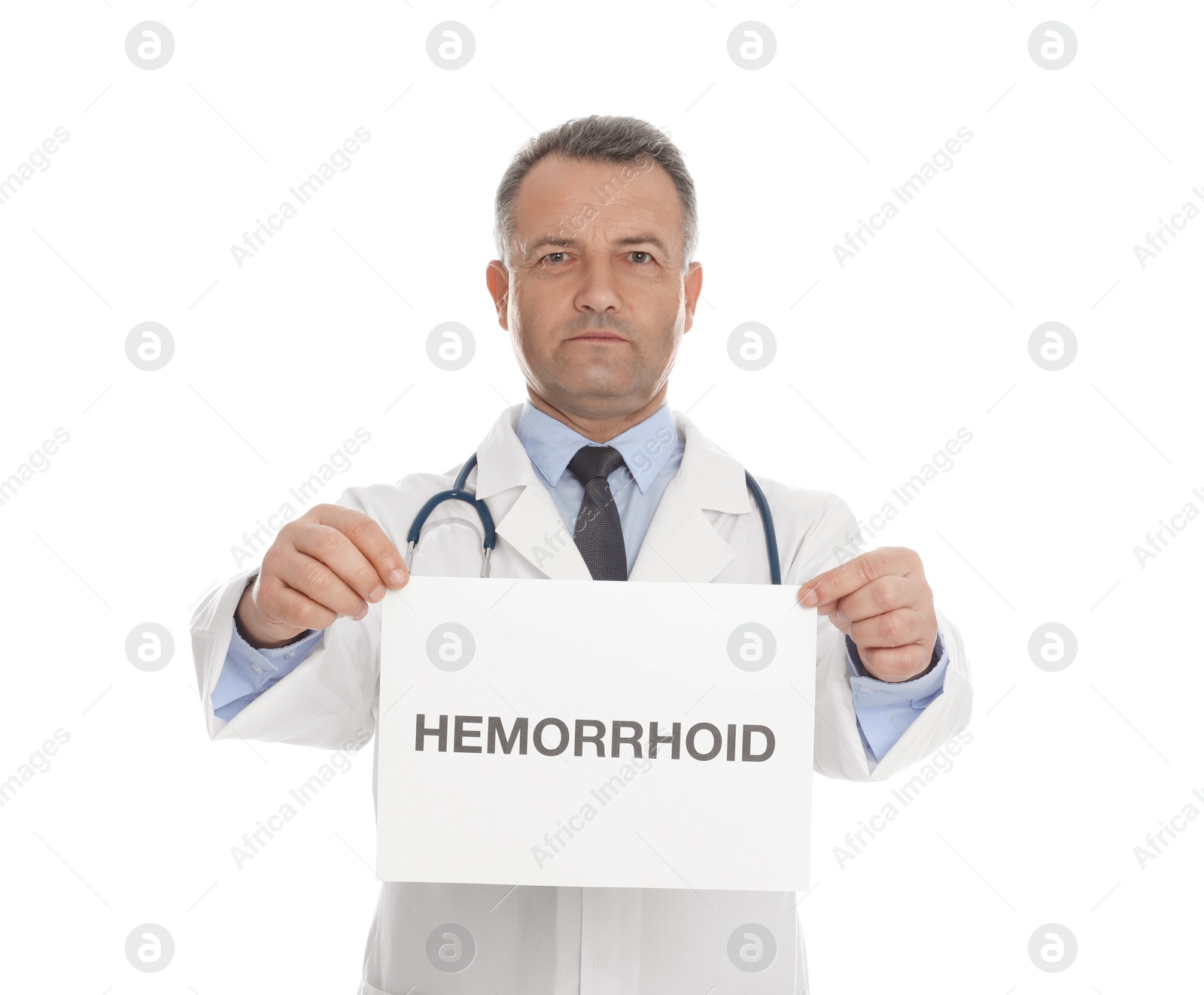 Photo of Doctor holding sign with word HEMORRHOID on white background