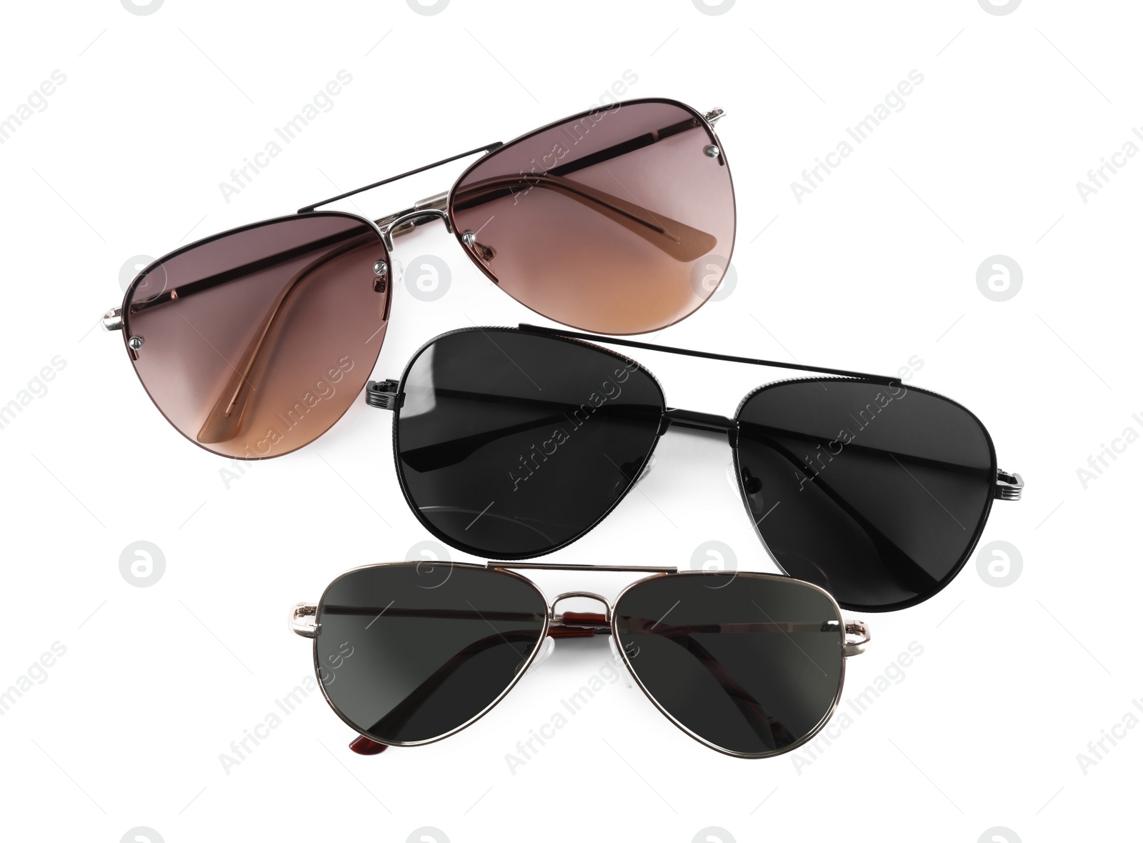 Photo of Different stylish sunglasses on white background. Sun protection