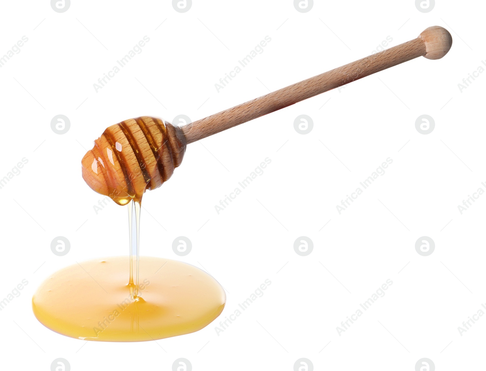 Photo of Fresh honey dripping from dipper on white background