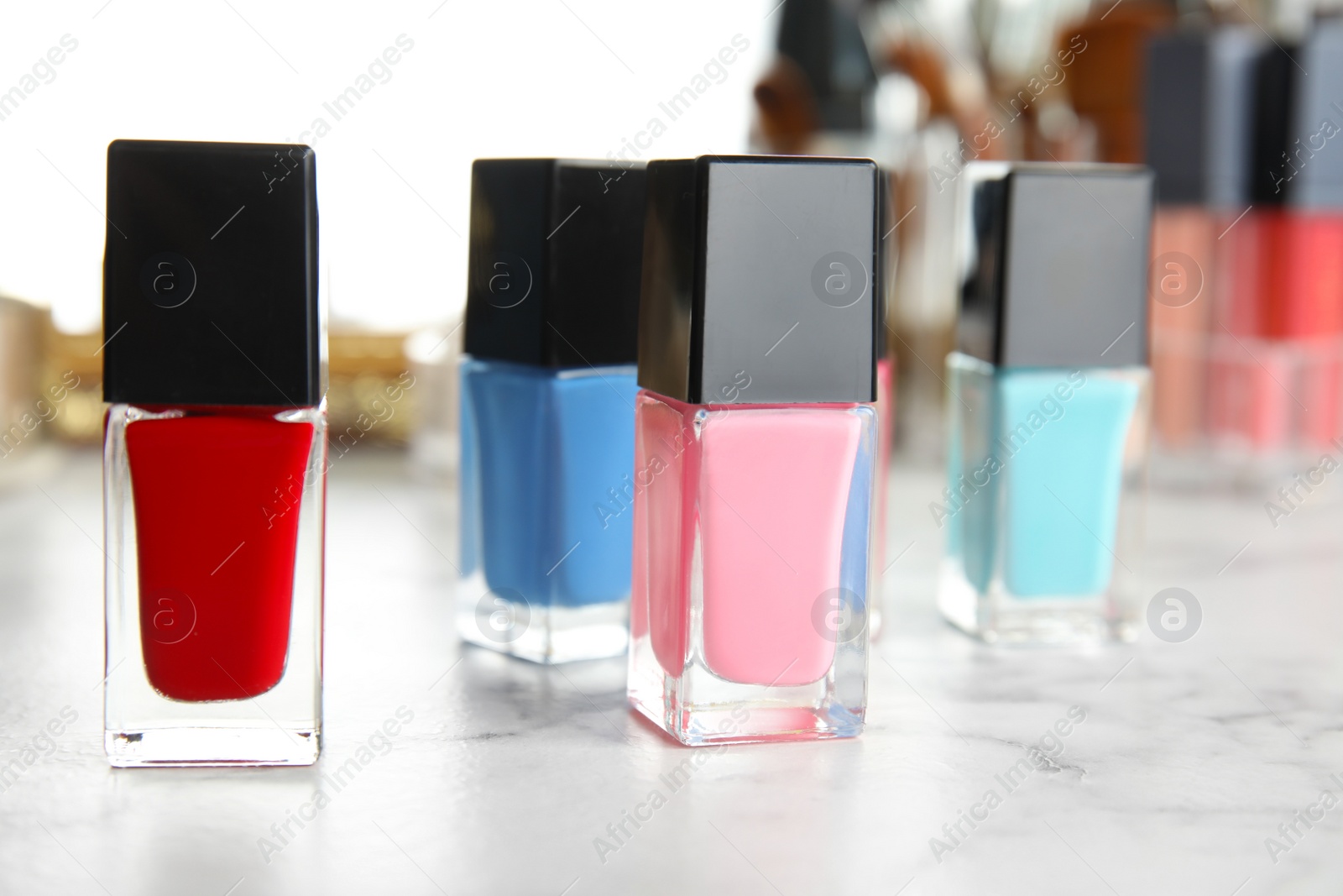 Photo of Bottles of nail polish on dressing table