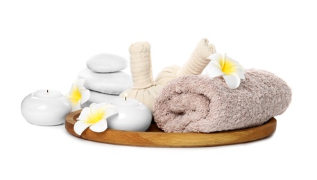 Photo of Beautiful spa composition with candles and flowers on white background