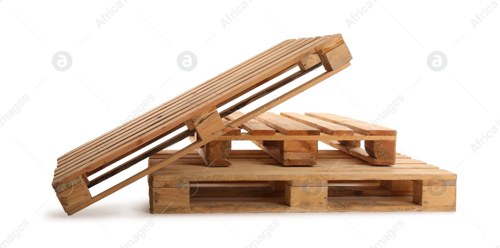 Photo of Wooden pallets isolated on white. Transportation and storage