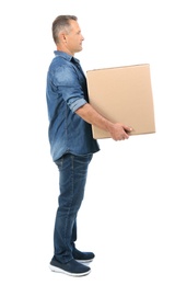 Photo of Full length portrait of mature man carrying carton box on white background. Posture concept