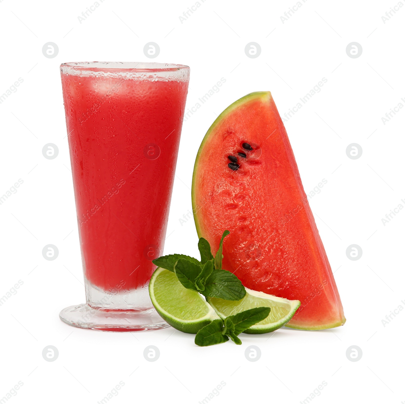 Photo of Glass of delicious watermelon drink, mint and cut fresh fruits isolated on white