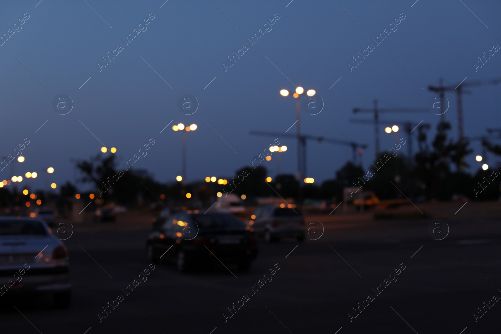 Photo of Blurred view of beautiful city in evening