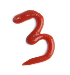 Photo of Number 3 written with ketchup on white background