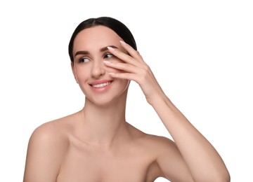 Portrait of beautiful young woman on white background