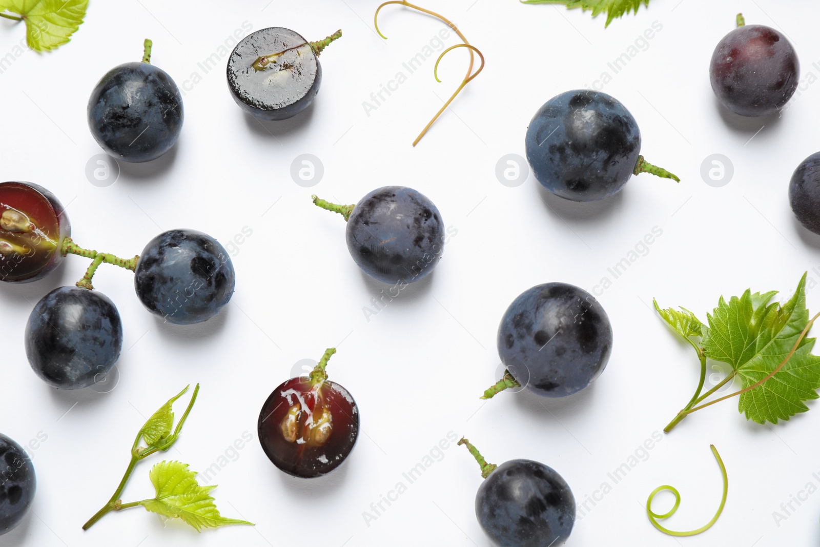 Photo of Fresh ripe juicy grapes on white background, top view