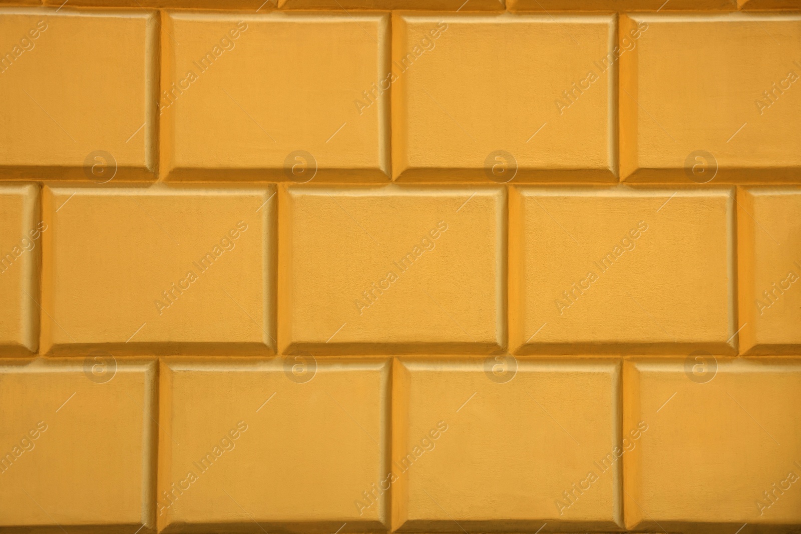 Photo of Texture of pale orange brick wall as background