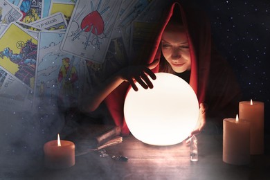 Double exposure with tarot cards and photo of soothsayer using crystal ball