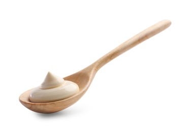 Photo of Natural yogurt in wooden spoon isolated on white