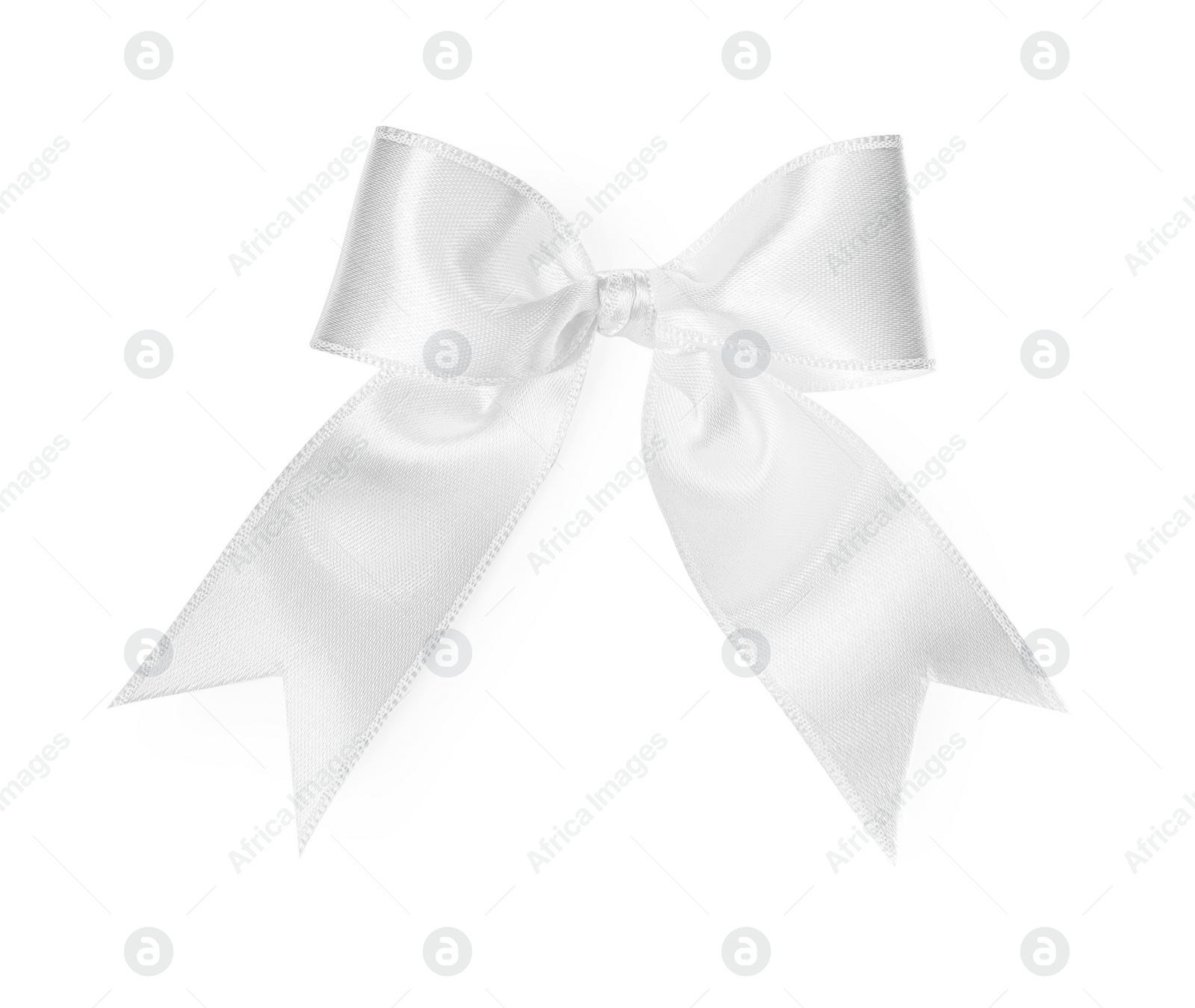 Photo of Satin ribbon tied in bow on white background, top view