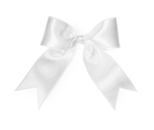 Photo of Satin ribbon tied in bow on white background, top view
