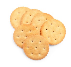 Photo of Tasty crispy round crackers isolated on white, top view