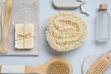 Bath accessories. Flat lay composition with personal care products on grey background