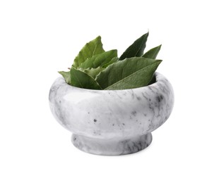 Photo of Bowl with bay leaves on white background
