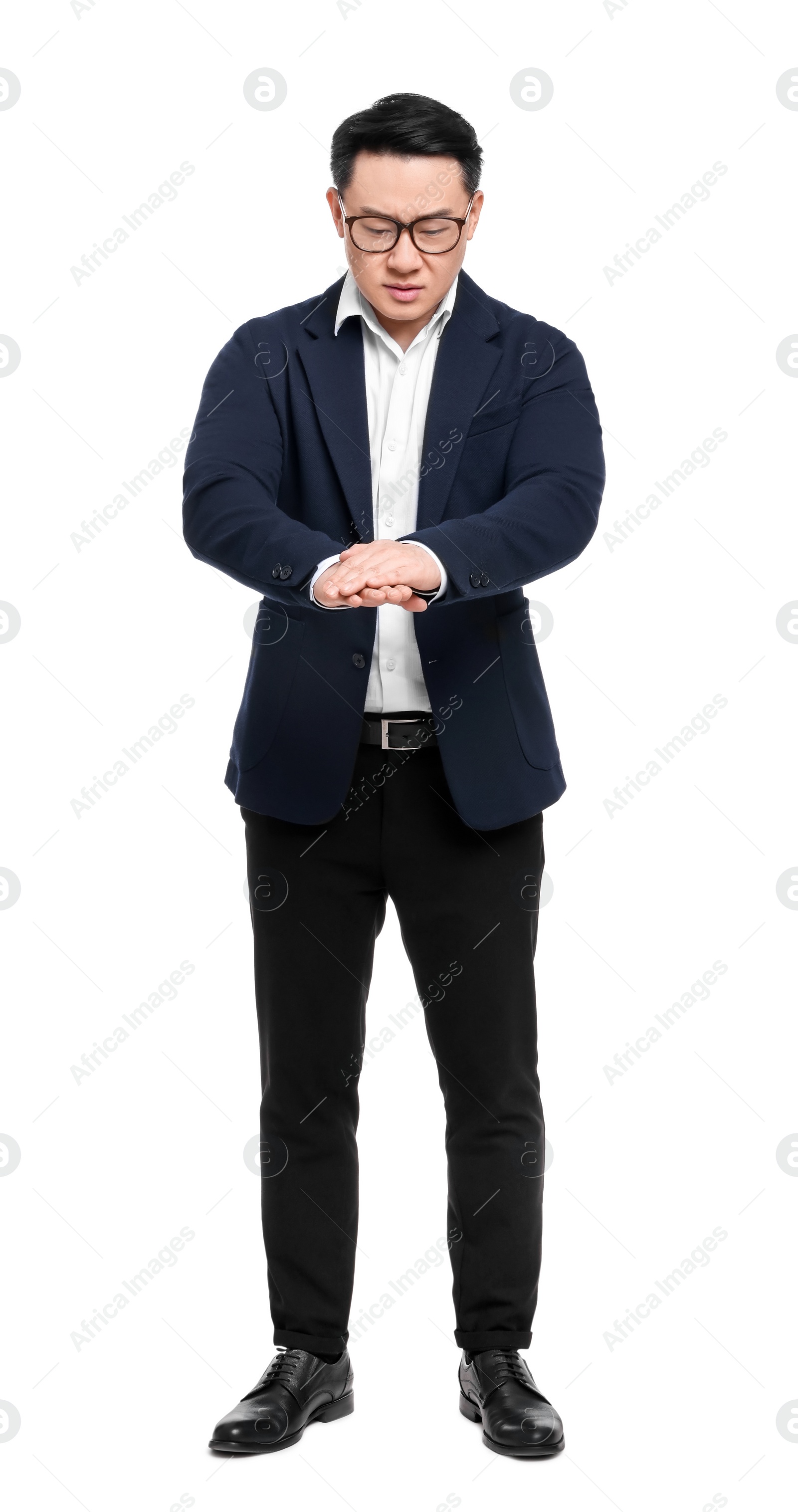 Photo of Businessman in suit posing on white background