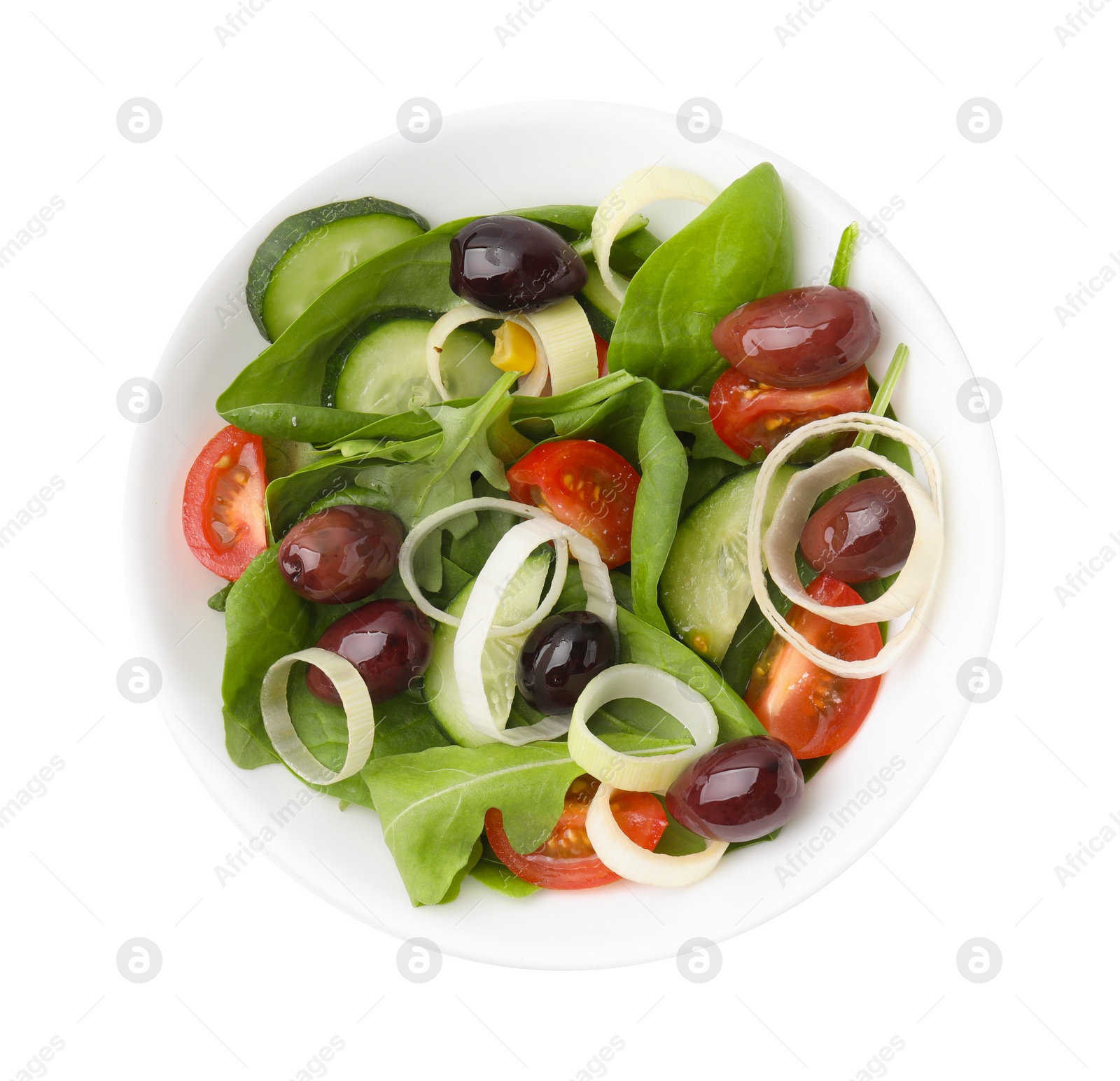 Photo of Bowl of tasty salad with leek and olives isolated on white, top view