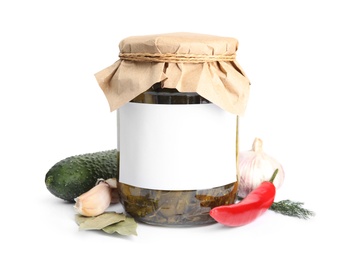 Photo of Jar of pickled cucumbers with blank sticker on white background, space for text