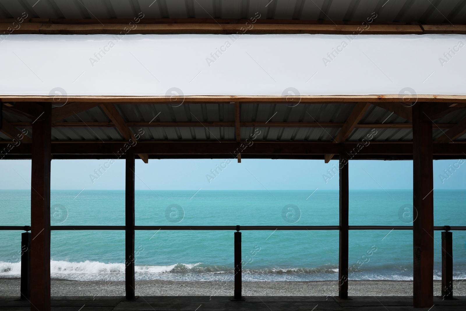 Photo of Canopy with picturesque view of beautiful blue sea