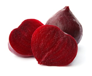 Photo of Whole and cut boiled red beets on white background
