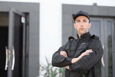 Photo of Portrait of male security guard in uniform outdoors