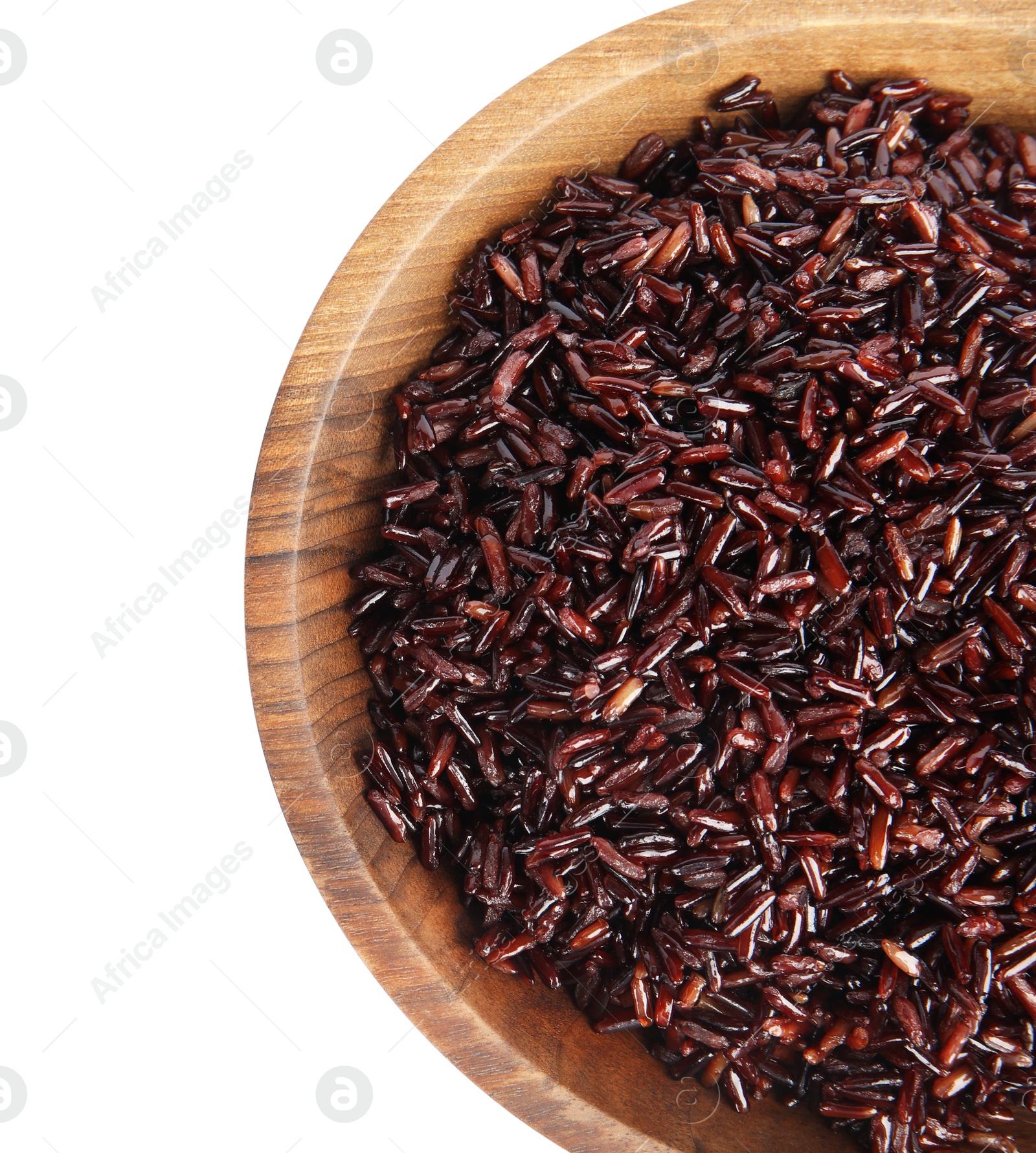 Photo of Bowl with delicious cooked brown rice on white background, top view