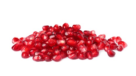 Photo of Pile of tasty pomegranate seeds on white background