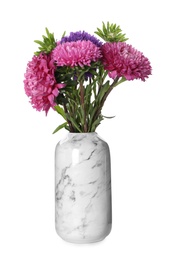 Bouquet of beautiful aster flowers in vase isolated on white
