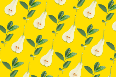 Image of Pattern of pear halves and leaves on yellow background