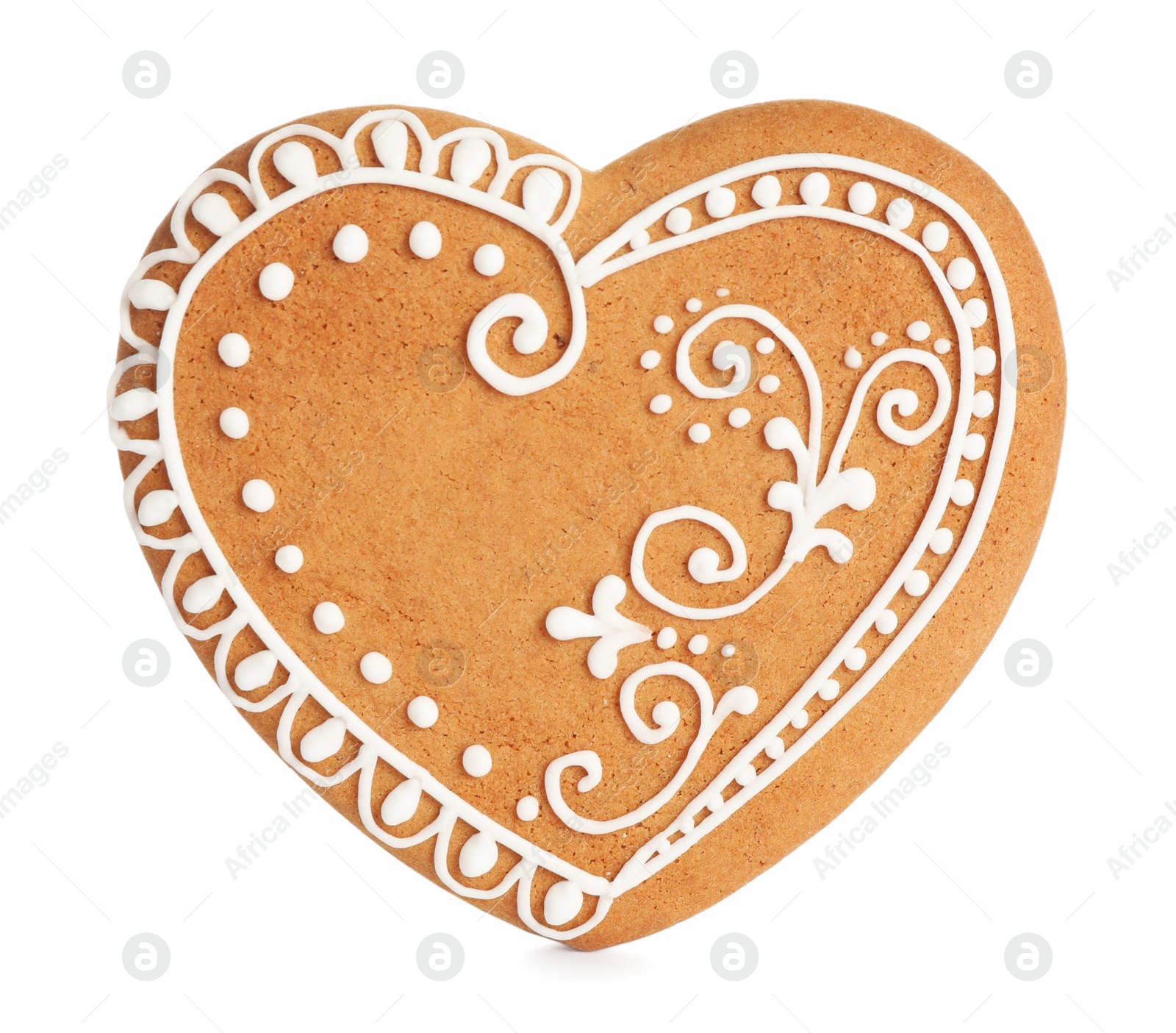 Photo of Gingerbread heart decorated with icing isolated on white