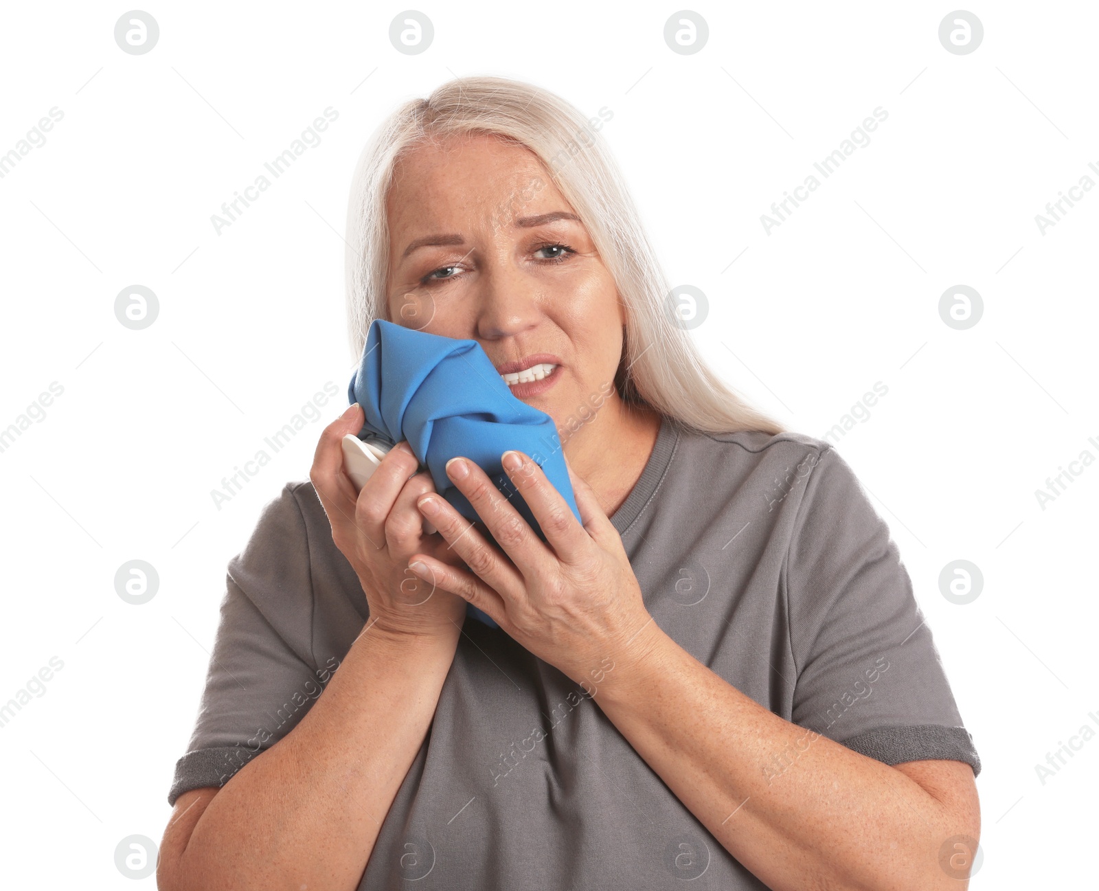 Photo of Mature woman suffering from toothache on white background