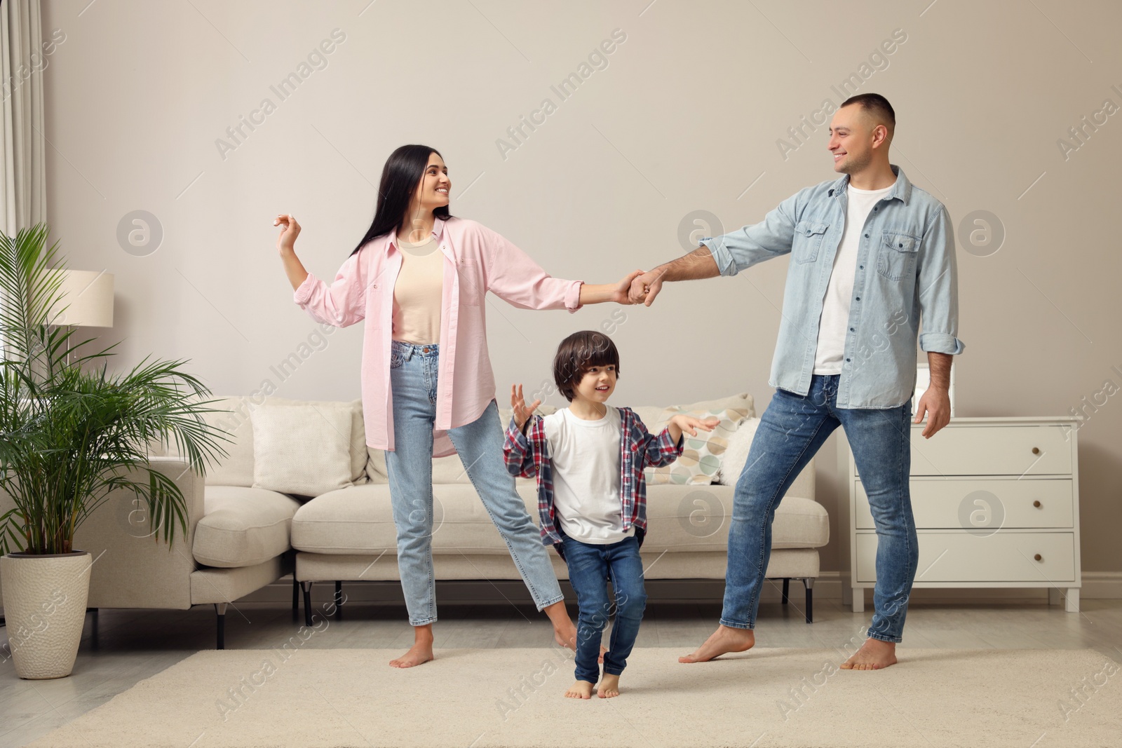 Photo of Happy family spending time together at home