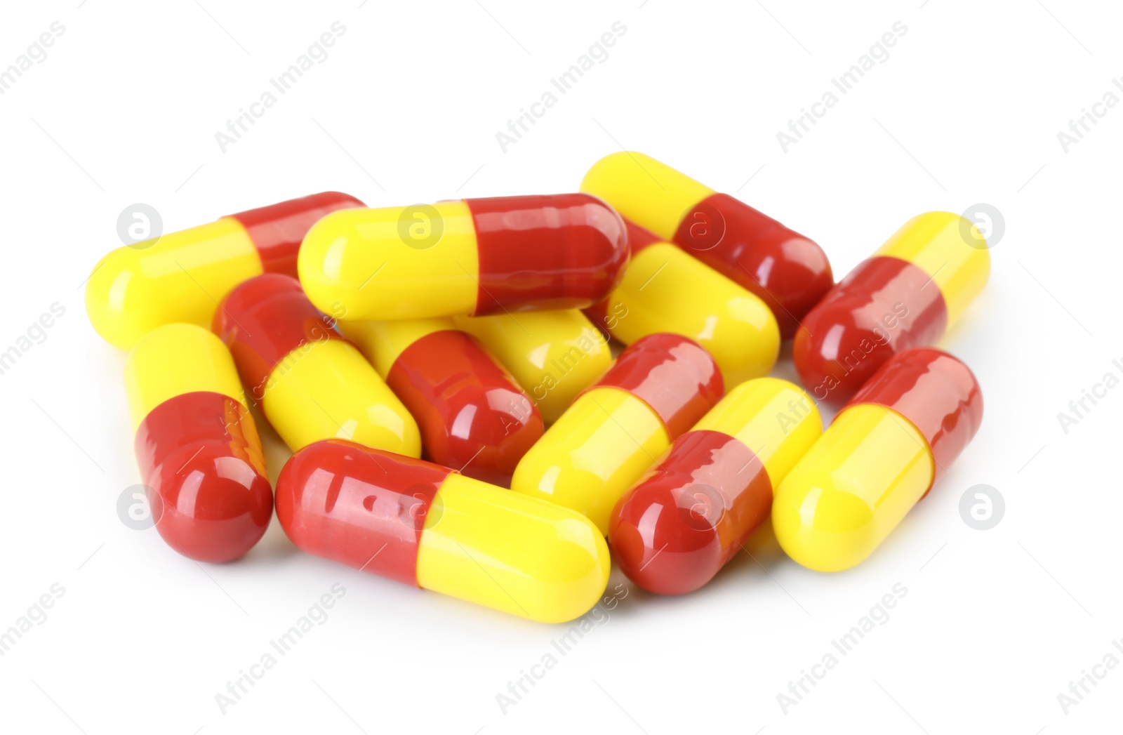 Photo of Many antibiotic pills isolated on white. Medicinal treatment