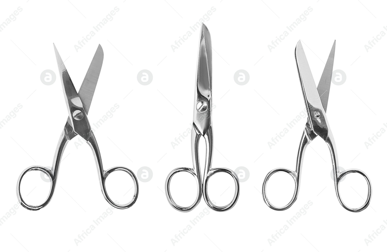 Image of Set of sharp sewing scissors on white background, top view