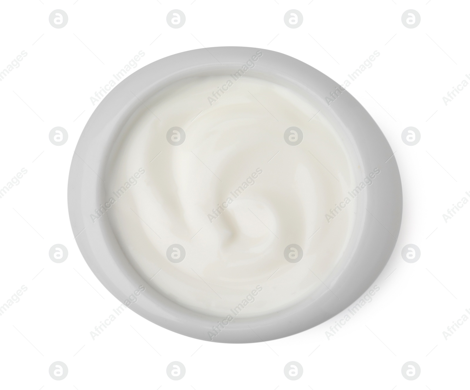 Photo of Delicious natural yogurt in bowl isolated on white, top view