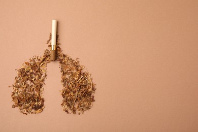 No smoking concept. Lungs made of dry tobacco and cigarette on brown background, flat lay with space for text