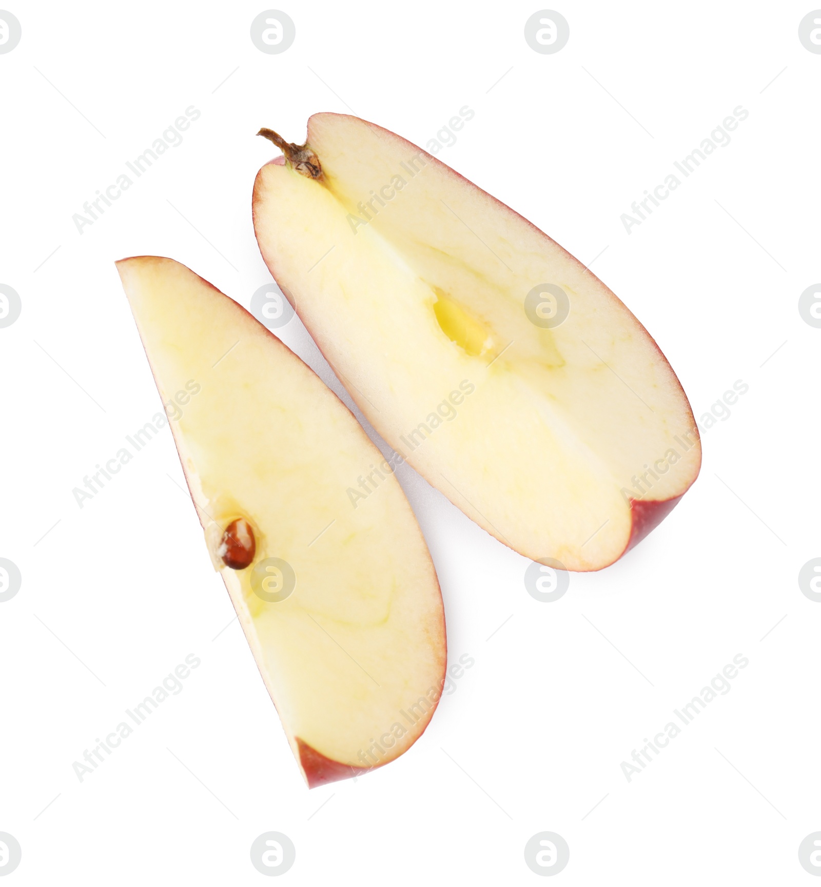 Photo of Slices of ripe red apple isolated on white, top view