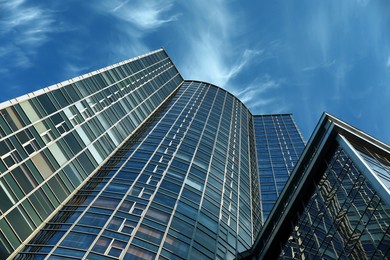 Photo of Beautiful modern building on sunny day, low angle view