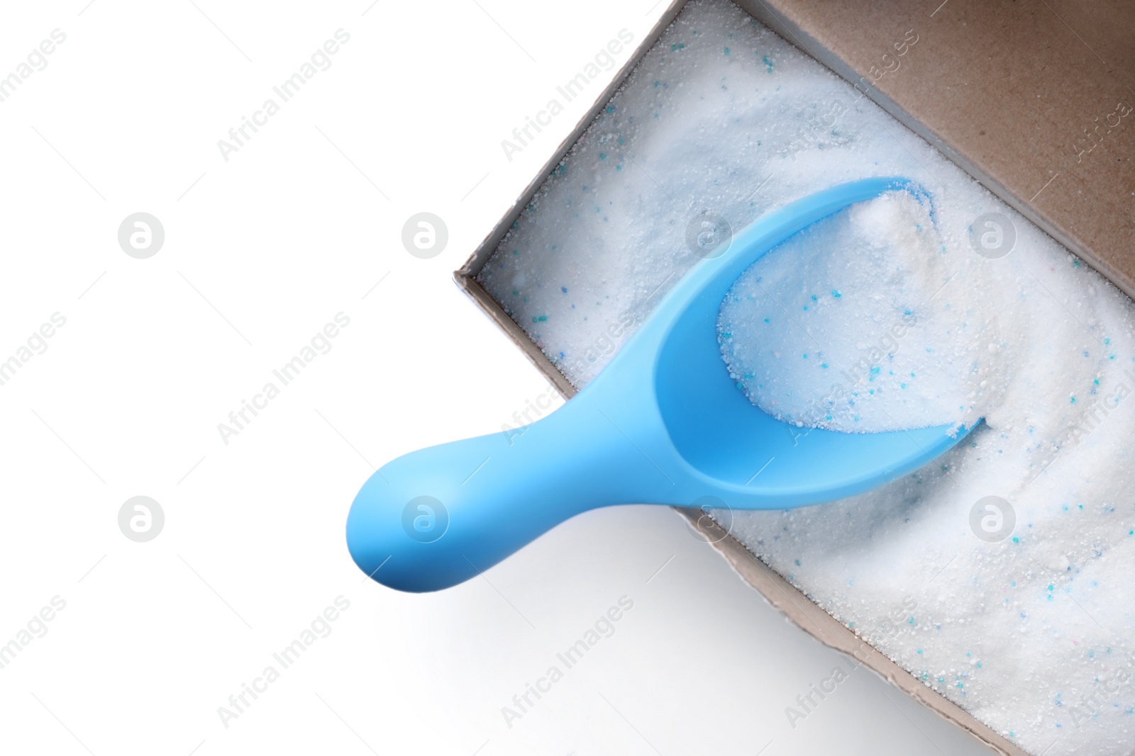 Photo of Open box with laundry powder and measuring scoop isolated on white, top view