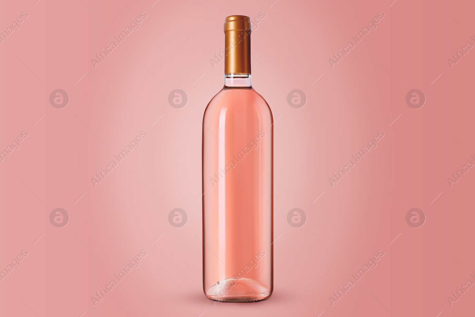 Image of Bottle of expensive rose wine on pink background