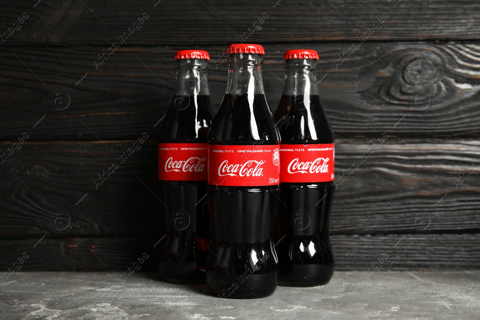 Photo of MYKOLAIV, UKRAINE - NOVEMBER 15, 2018: Bottles of Coca Cola on table