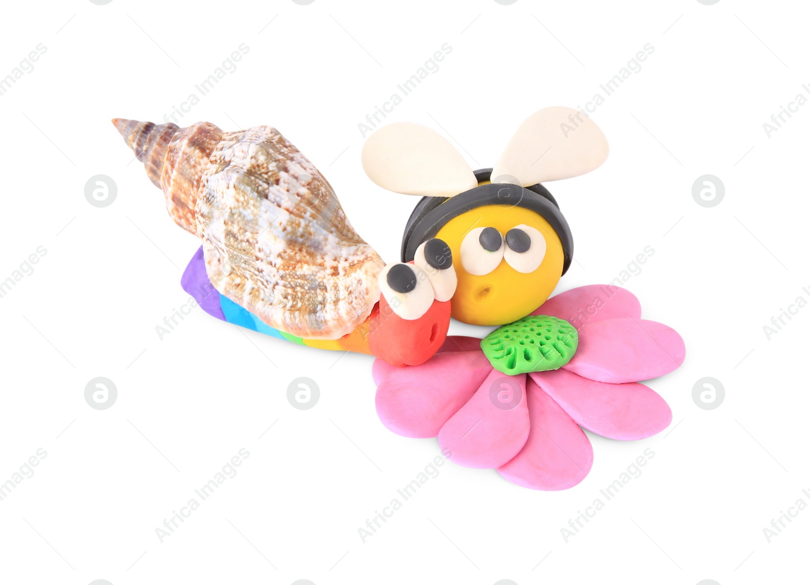 Photo of Bee with flower and snail made from plasticine on white background. Children's handmade ideas