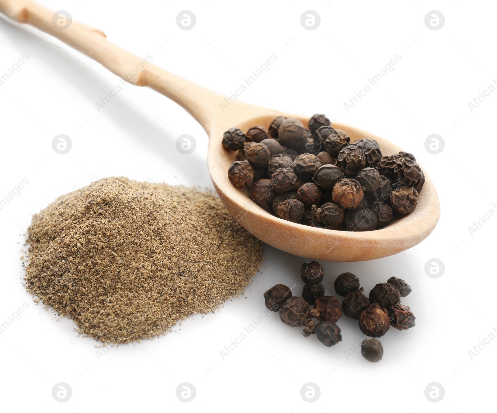 Photo of Wooden spoon with black pepper grains and heap of powder on white background