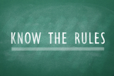 Image of Phrase Know the rules on green chalkboard