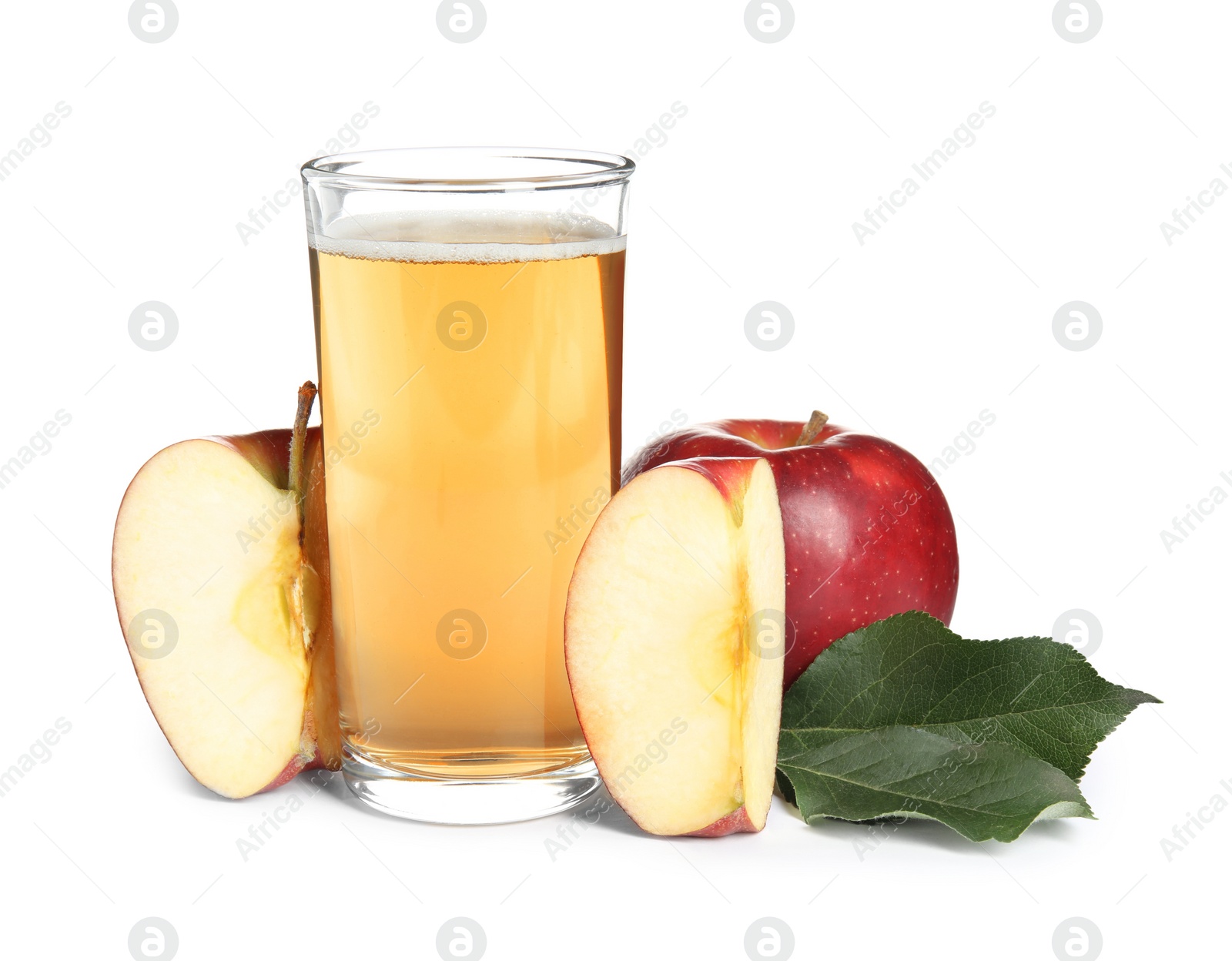 Photo of Delicious cider in glass near ripe apples on white background